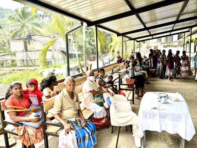 people in Sri Lanka sitting in a waiting area